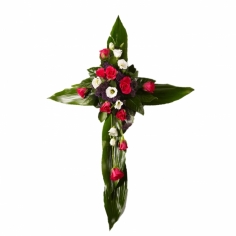 Траурная композиция из роз с зеленью в виде креста